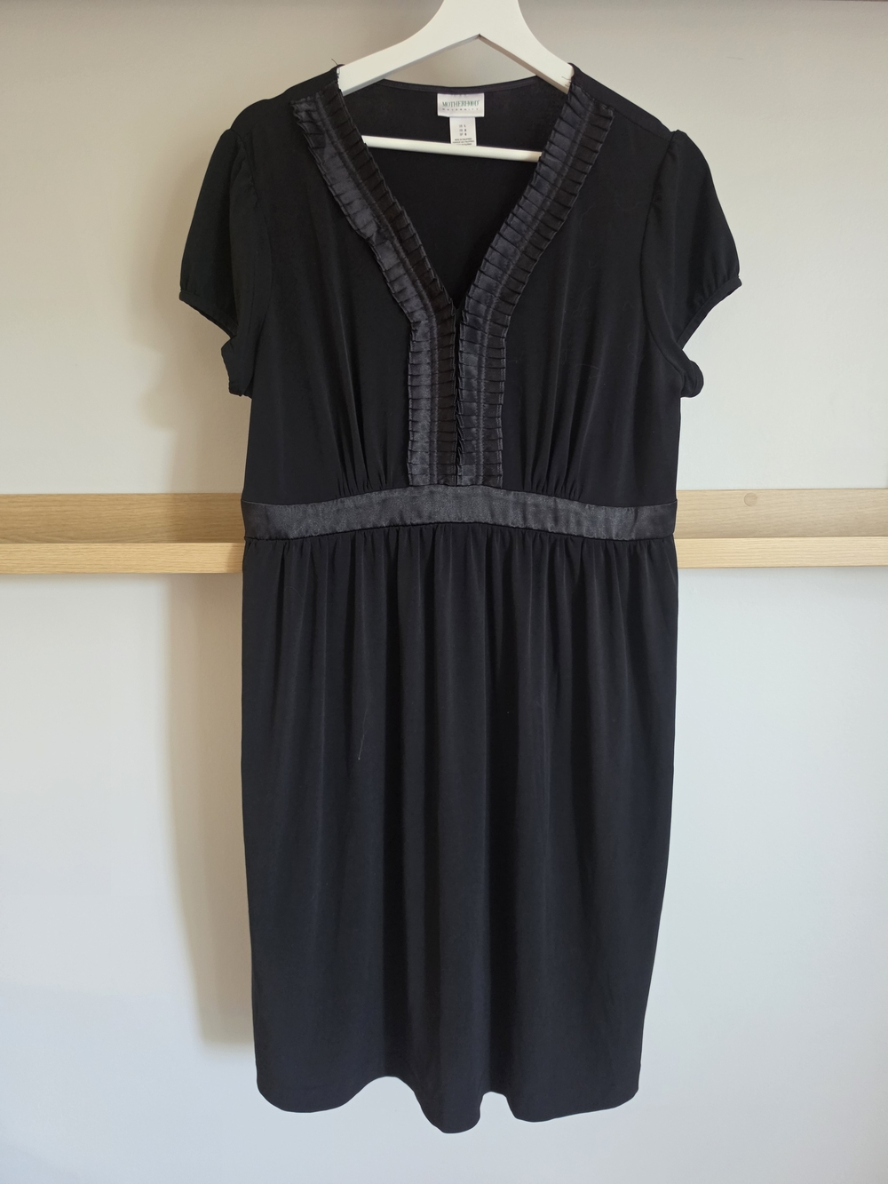Motherhood Maternity Black V‑Neck Empire Waist Midi Dress with Pleated Trim